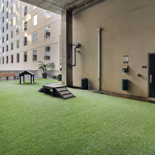 a building with a green lawn