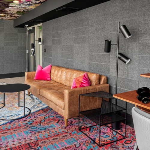 a living room with a couch and a table