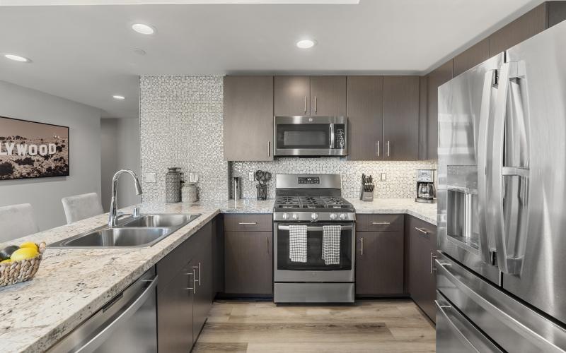 a kitchen with stainless steel appliances
